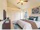 Well-lit main bedroom features a ceiling fan, double closet, and calming decor at 1515 Lions Club Dr, Brandon, FL 33511