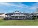 The property boasts a large screened-in patio and lush greenery, creating a private outdoor space at 1515 Lions Club Dr, Brandon, FL 33511