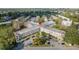 Aerial view of condo building, parking lot, and surrounding area at 2262 Swedish Dr # 12, Clearwater, FL 33763