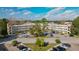 Aerial view of an apartment building with ample parking at 2262 Swedish Dr # 12, Clearwater, FL 33763