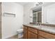 Updated bathroom with granite vanity, tiled shower, and toilet at 2262 Swedish Dr # 12, Clearwater, FL 33763