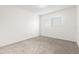 Spacious bedroom with neutral walls and carpeted floors at 2262 Swedish Dr # 12, Clearwater, FL 33763