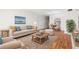 Living room and dining area with hardwood floors, neutral decor at 2262 Swedish Dr # 12, Clearwater, FL 33763