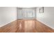 Empty living room with hardwood floors and lots of natural light at 2262 Swedish Dr # 12, Clearwater, FL 33763
