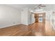 Living room with hardwood floors and open concept to kitchen at 2262 Swedish Dr # 12, Clearwater, FL 33763