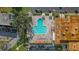 Aerial view showing community pool with lounge chairs at 2262 Swedish Dr # 12, Clearwater, FL 33763
