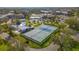 Aerial view of tennis courts nestled in a lush community setting at 2262 Swedish Dr # 12, Clearwater, FL 33763
