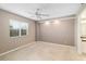 Bright bedroom with window, ceiling fan, and neutral wall tones at 2320 Terra Ceia Bay Blvd # 403, Palmetto, FL 34221