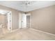 Well-lit bedroom with ceiling fan and access to bathroom at 2320 Terra Ceia Bay Blvd # 403, Palmetto, FL 34221