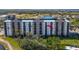 Exterior view of condo building showcasing balconies and landscaping at 2320 Terra Ceia Bay Blvd # 403, Palmetto, FL 34221