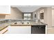 Kitchen with granite countertops, white cabinets, and appliances at 2320 Terra Ceia Bay Blvd # 403, Palmetto, FL 34221