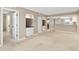 Spacious living room with built-in shelving and access to other rooms at 2320 Terra Ceia Bay Blvd # 403, Palmetto, FL 34221