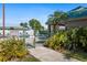 Gated community pool with lush tropical landscaping at 2320 Terra Ceia Bay Blvd # 403, Palmetto, FL 34221