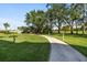 Well-maintained walkway through lush landscaping at 2320 Terra Ceia Bay Blvd # 403, Palmetto, FL 34221