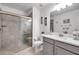 Bathroom with walk-in shower and vanity at 31371 Cabana Rye Ave, San Antonio, FL 33576