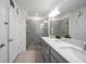 Double vanity bathroom with a walk-in shower at 31371 Cabana Rye Ave, San Antonio, FL 33576