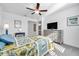 Relaxing bedroom with a comfy bed, dresser, and flat-screen TV at 31371 Cabana Rye Ave, San Antonio, FL 33576