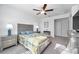 Spacious bedroom with a comfortable bed and stylish nightstands at 31371 Cabana Rye Ave, San Antonio, FL 33576