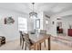 Cozy dining area with a rustic wooden table and wine rack at 31371 Cabana Rye Ave, San Antonio, FL 33576