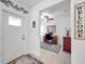 Bright entryway with view into an office and wood-look floors at 31371 Cabana Rye Ave, San Antonio, FL 33576