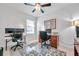 Home office with desk, chair, and ample natural light at 31371 Cabana Rye Ave, San Antonio, FL 33576