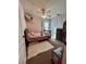 Cozy bedroom with ceiling fan and playful decor at 5627 War Admiral Dr, Wesley Chapel, FL 33544