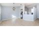 Open dining space offering a view into the kitchen, ideal for entertaining at 5627 War Admiral Dr, Wesley Chapel, FL 33544