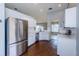 Well-equipped kitchen with stainless steel appliances, ample cabinetry, and modern finishes at 5627 War Admiral Dr, Wesley Chapel, FL 33544