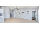Open living space featuring modern ceiling fan and neutral color palette at 5627 War Admiral Dr, Wesley Chapel, FL 33544
