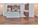 Spacious kitchen with island, stainless steel appliances, and dark wood cabinets at 6836 Park Strand Dr, Apollo Beach, FL 33572