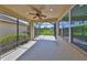 Spacious screened porch overlooking backyard and nature at 6836 Park Strand Dr, Apollo Beach, FL 33572