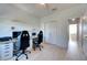 Home office with two workstations and built-in shelving at 708 Fern Leaf Dr, Ruskin, FL 33570