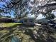 Large backyard with shed and patio. Room for outdoor entertaining and relaxation at 1104 Winchester N Rd, St Petersburg, FL 33710