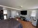 Spacious main bedroom with large windows and ample floor space at 1104 Winchester N Rd, St Petersburg, FL 33710
