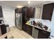 Kitchen with stainless steel appliances and ample counter space at 1104 Winchester N Rd, St Petersburg, FL 33710