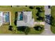 Bird's-eye view of house, pool and yard at 1200 Yawl Way, Venice, FL 34285