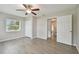 Bright bedroom with double door closet and view of hallway at 1308 Ivywood Dr, Brandon, FL 33510