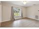 Dining room features tile floors and a large window with curtains at 1308 Ivywood Dr, Brandon, FL 33510