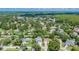 Wide aerial view of neighborhood featuring various homes at 15722 Gardenside Ln, Tampa, FL 33624