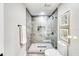 Modern bathroom with a large walk-in shower and stylish fixtures at 15722 Gardenside Ln, Tampa, FL 33624