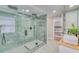 Large walk-in shower with green marble tile at 15722 Gardenside Ln, Tampa, FL 33624