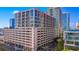 Aerial view of a modern building with parking garage, located in a city setting at 175 2Nd S St # P-08, St Petersburg, FL 33701