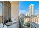 Relax on the balcony with comfortable seating and enjoy the city skyline views at 175 2Nd S St # P-08, St Petersburg, FL 33701