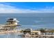 Beautiful waterfront view showcasing a modern building, marina, and sailboats on the water at 175 2Nd S St # P-08, St Petersburg, FL 33701