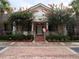 Community building with landscaping and brick walkway at 18235 Bridle Club Dr # 18235, Tampa, FL 33647
