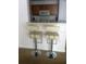 Small kitchen with breakfast bar and two bar stools at 18235 Bridle Club Dr # 18235, Tampa, FL 33647