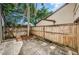 Private backyard with wooden fence and patio at 1881 N Hercules Ave # 803, Clearwater, FL 33765