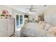 Main bedroom with pool view and large bed at 2019 Magnolia Dr, Clearwater, FL 33764