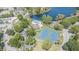 Community pool, tennis courts, and lake view from above at 21550 Clubside Loop, Lutz, FL 33549