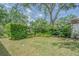 Well-maintained backyard with lush greenery at 21550 Clubside Loop, Lutz, FL 33549